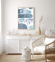 Load image into Gallery viewer, Paper print of an abstracted surfing scene framed in a timber frame positioned in a coastal decorated home